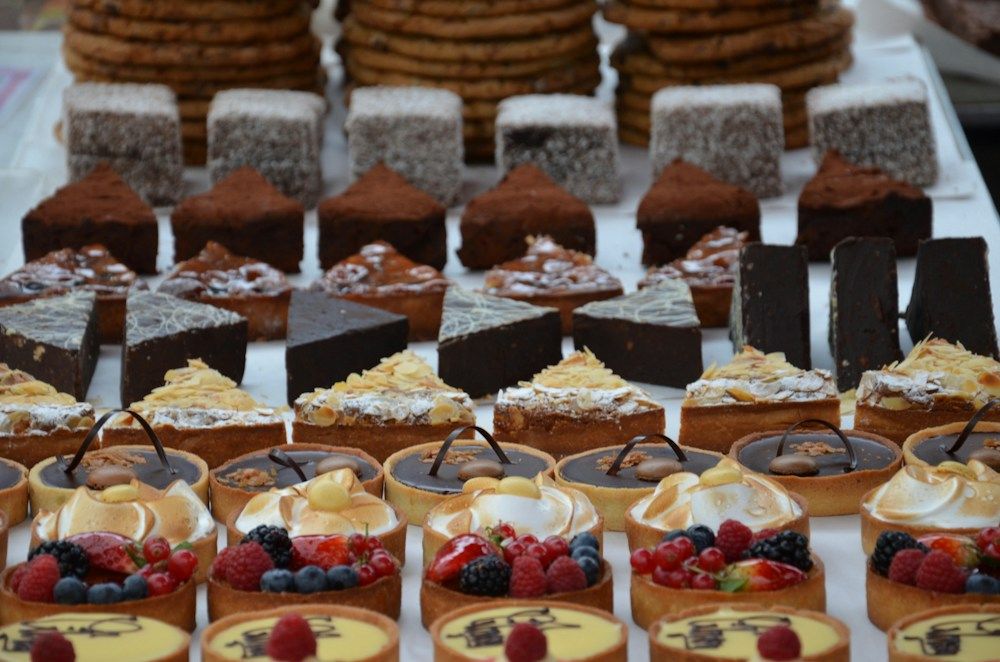 A selection of fruit and chocolate tarts