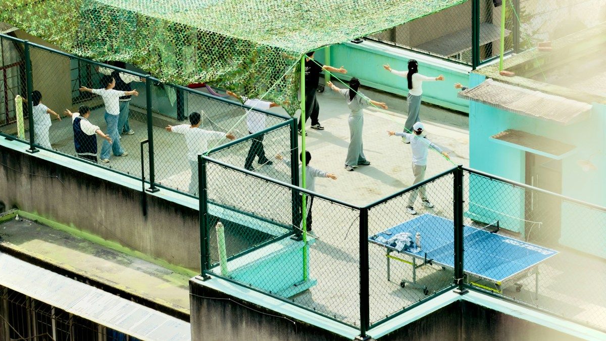 Yoga class practicing on a rooftop