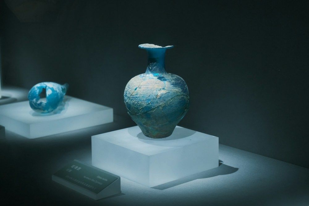 Ceramic artifact displayed on pedestal