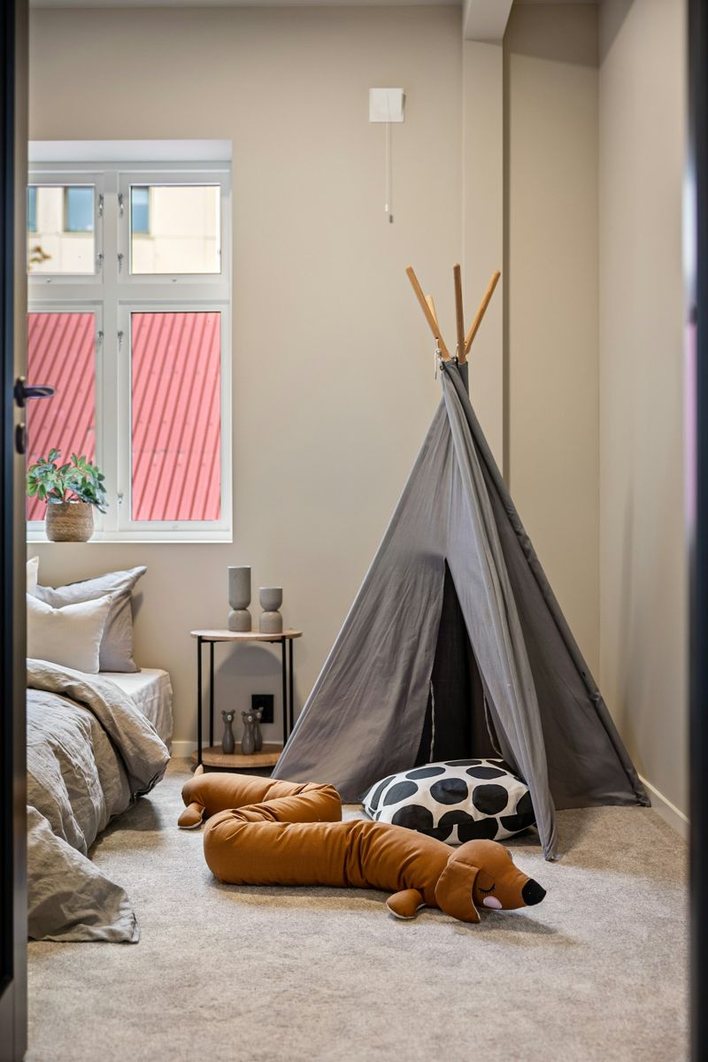 Indoor tent beside a bedroom window