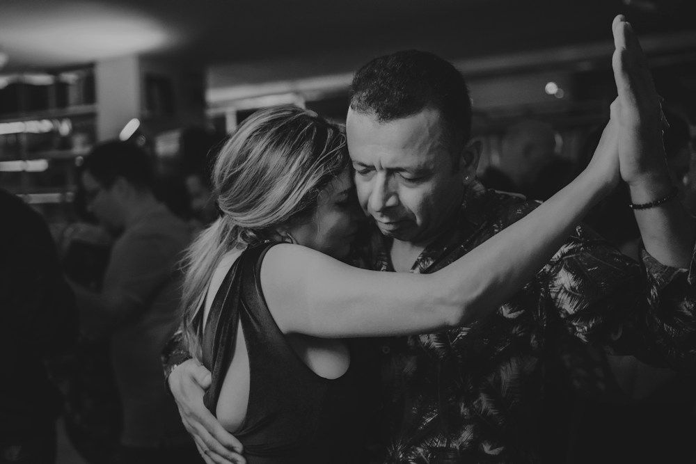 Couple dancing in a dimly lit room