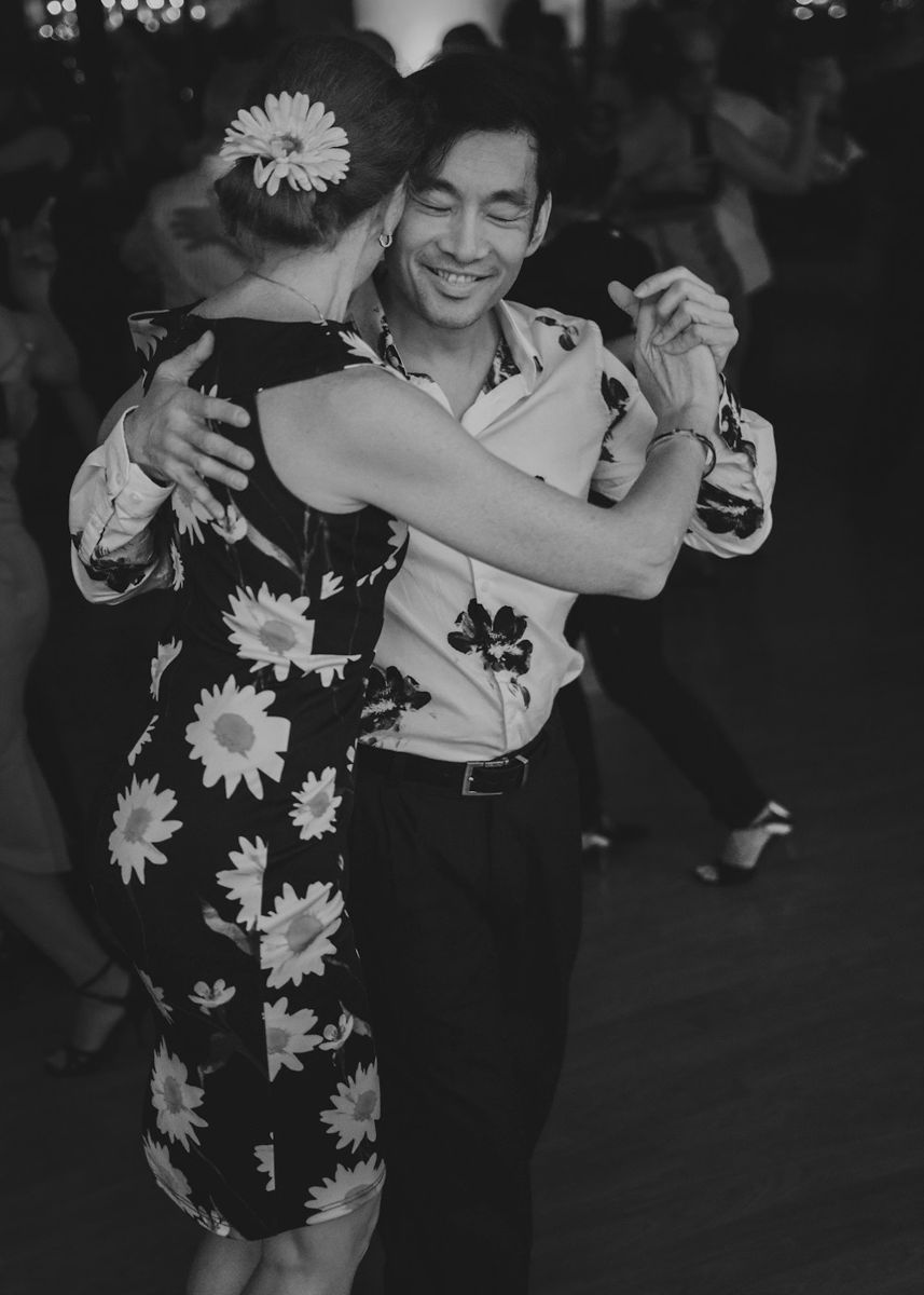 A couple dancing together at a formal event