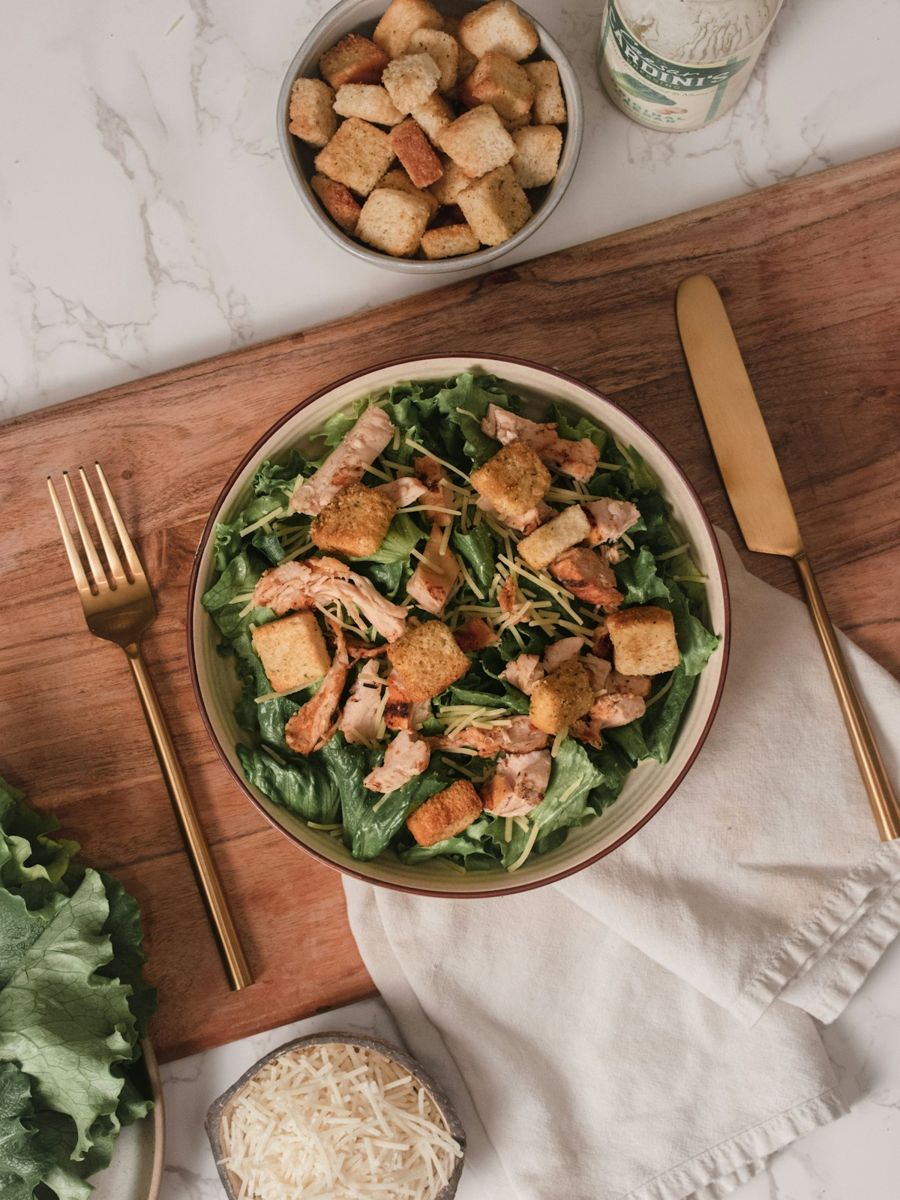 Green salad served in a green ceramic bowl