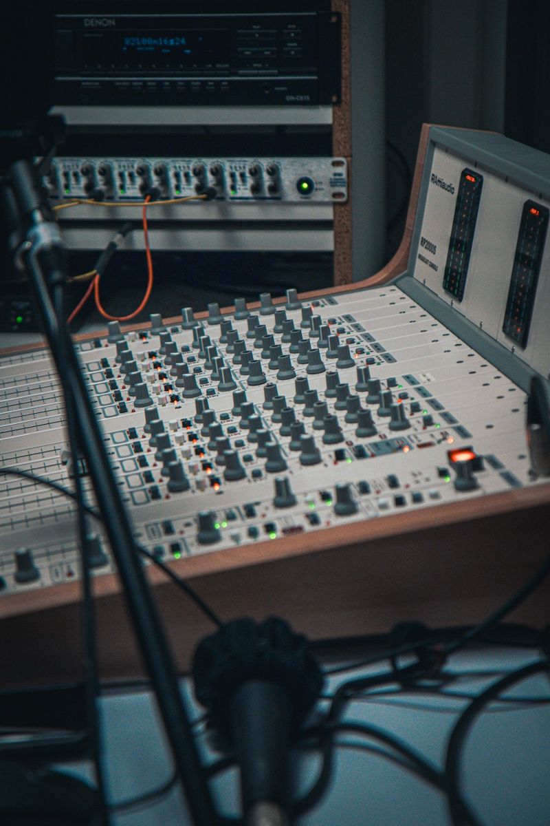 Radio studio mixing console and microphone
