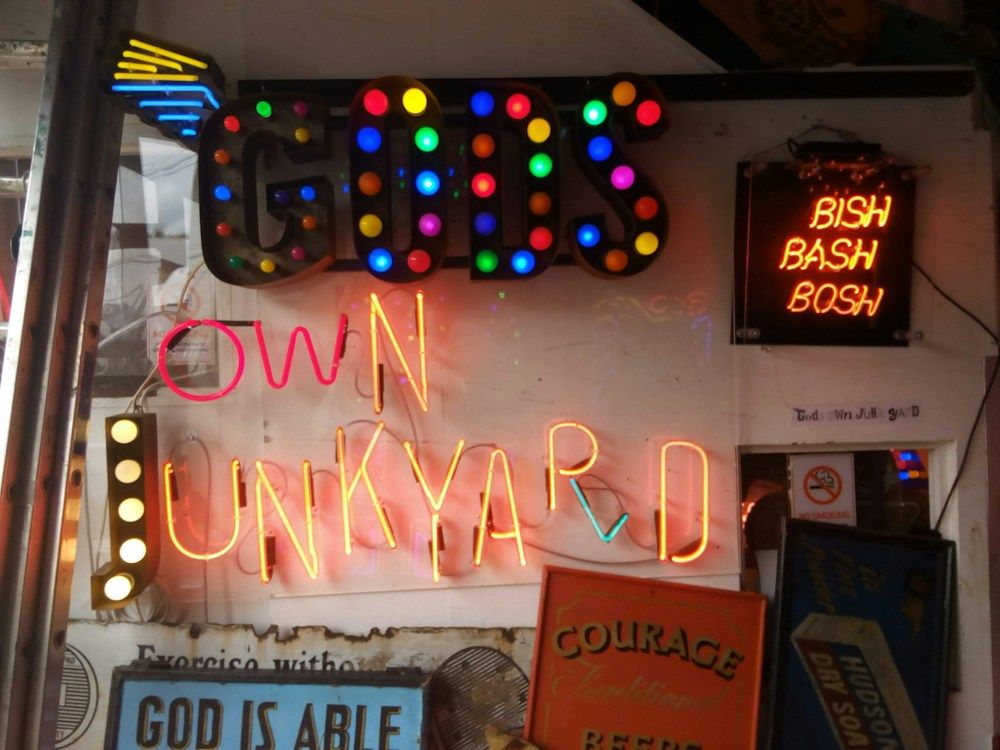 Colorful glowing neon signs in a window