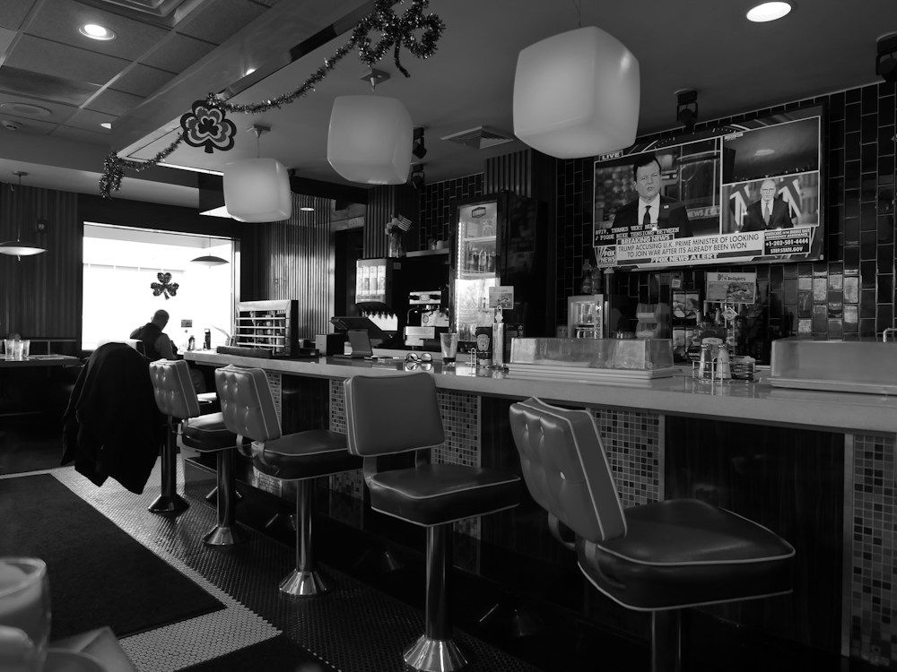 Retro diner interior with counter and stools