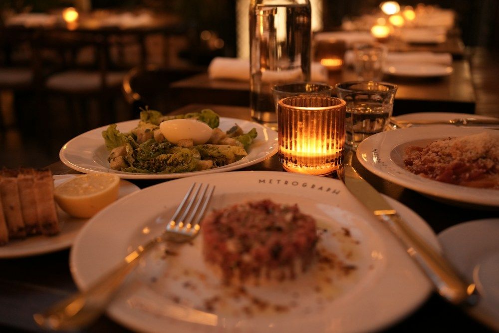 Food and candles on a dinner table