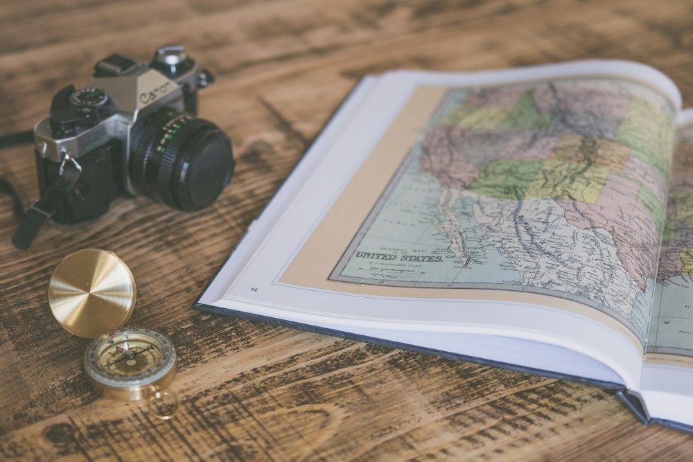 Compass on an open paper map