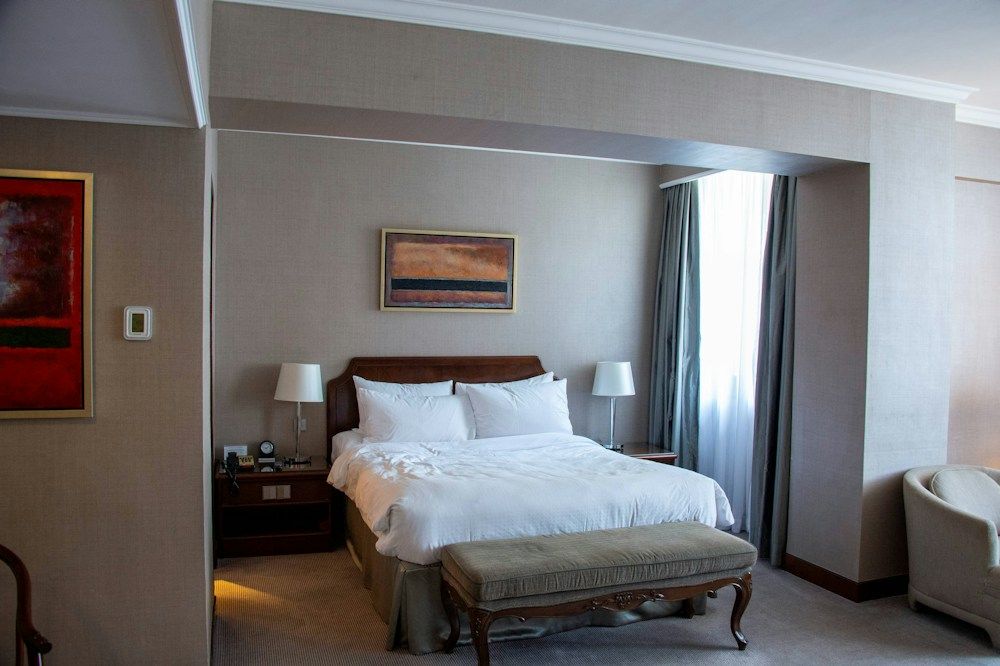 Simple quiet hotel bedroom