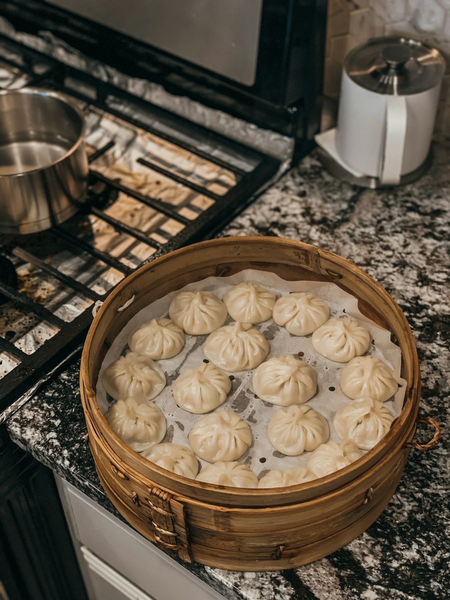 Steamed dumplings in a bamboo basket