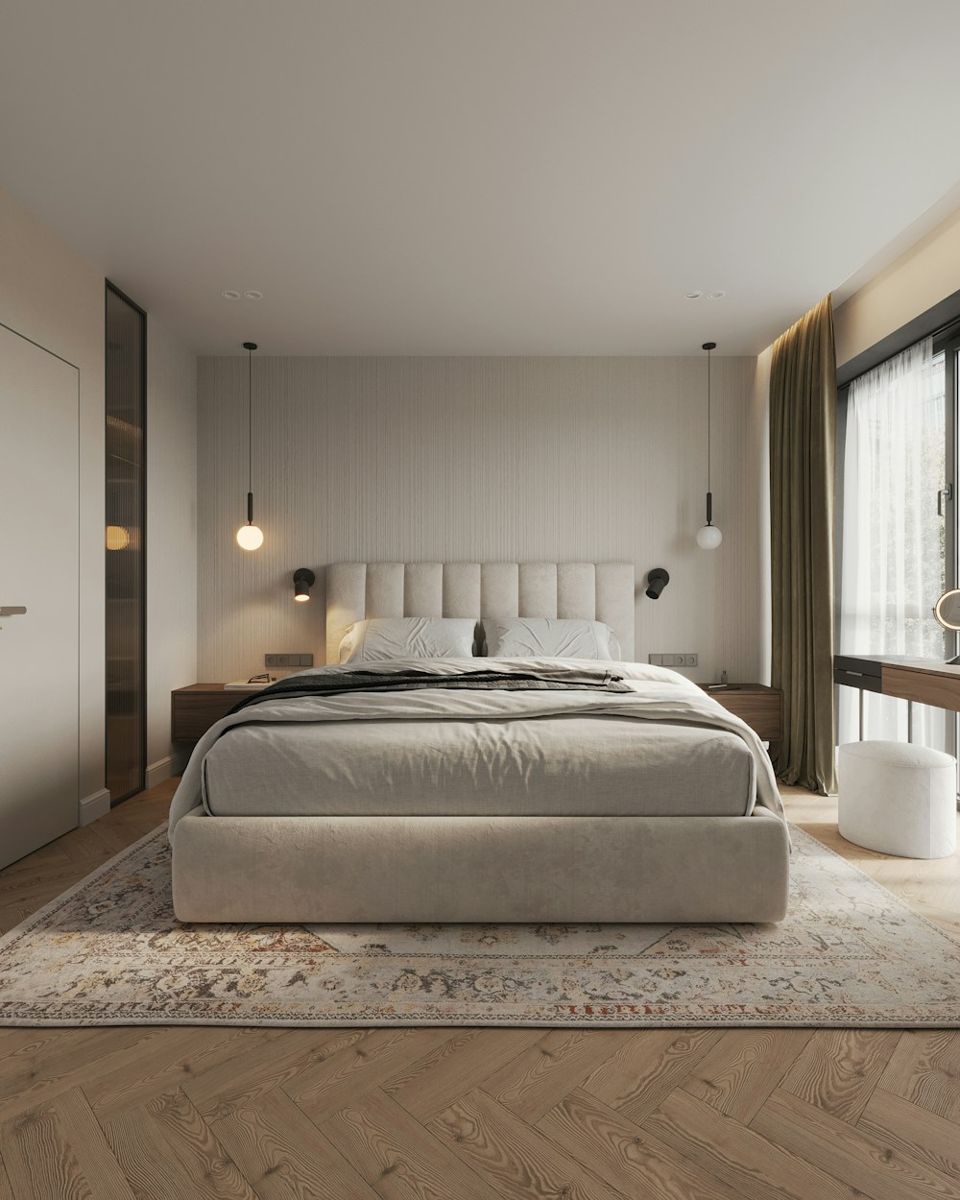Bedroom with upholstered bed and large window