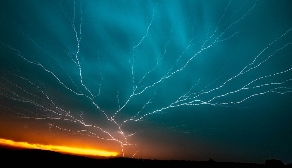 Lightning branching across a stormy sky
